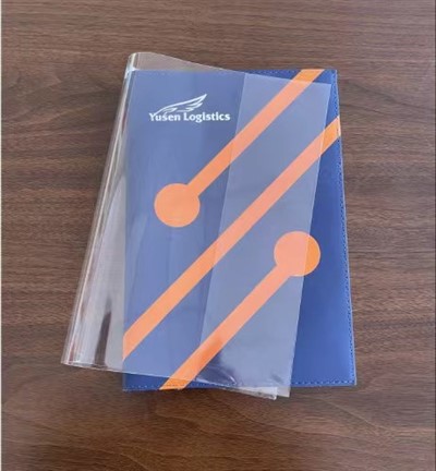 Gjennomsiktig bokomslagsveske